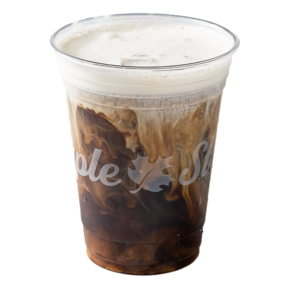 A cup of cold brew coffee topped with vanilla sweet cream foam